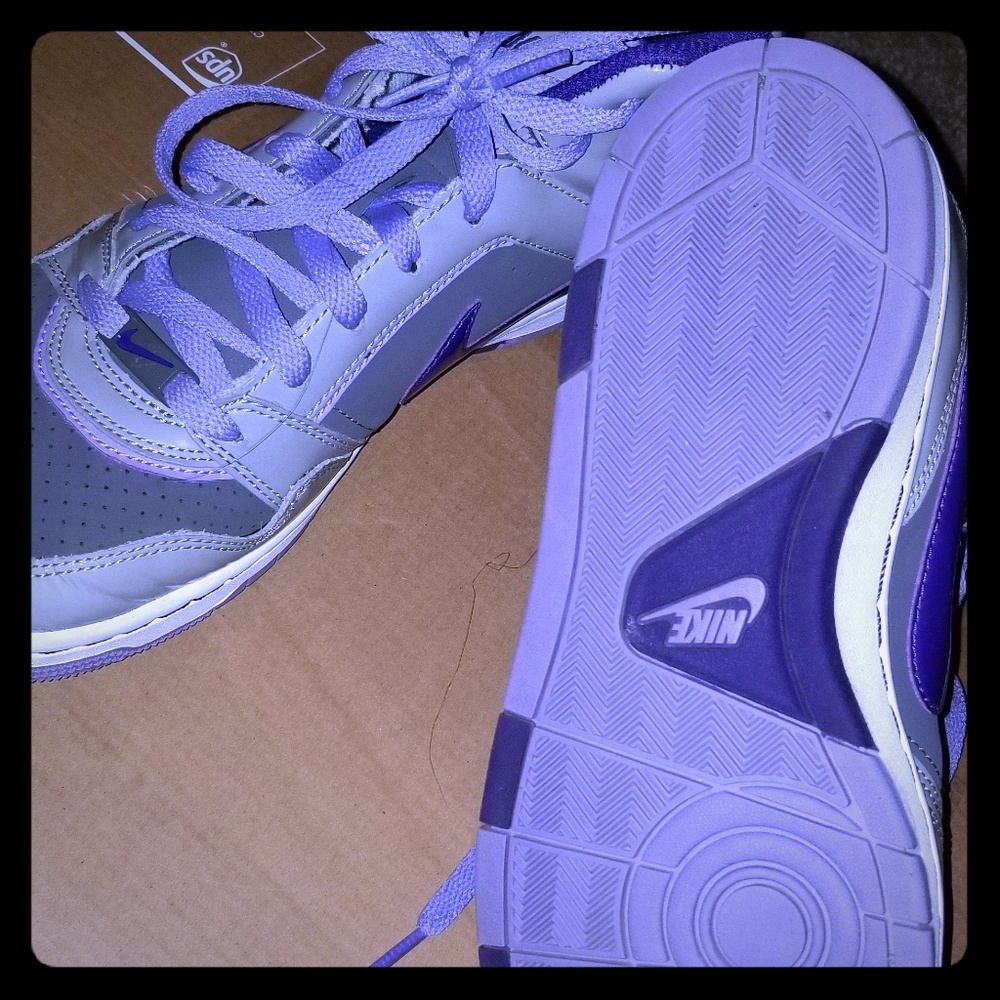 Like new! Purple and grey leopard Nike high tops!